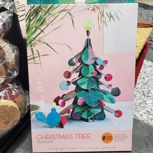 Christmas Tree Peacock made with recycled cardboard and veg inks. Brand new